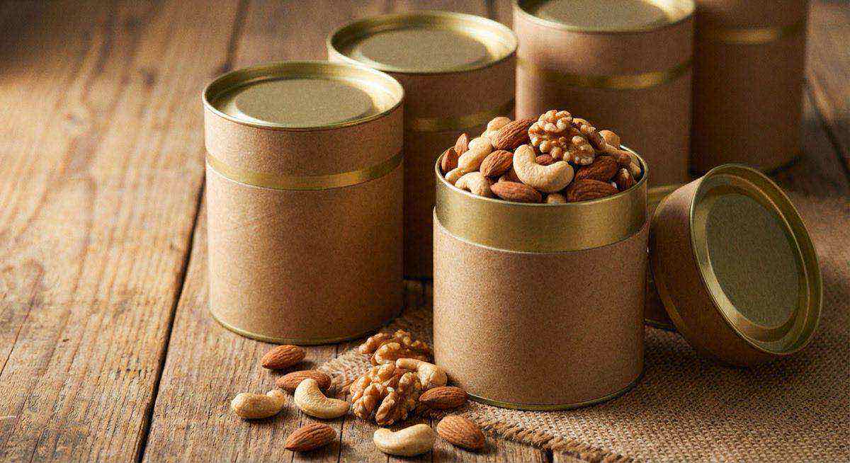 堅果紙罐包裝展示綜合堅果密封保鮮，品牌送禮黃金組合客製紙罐設計。